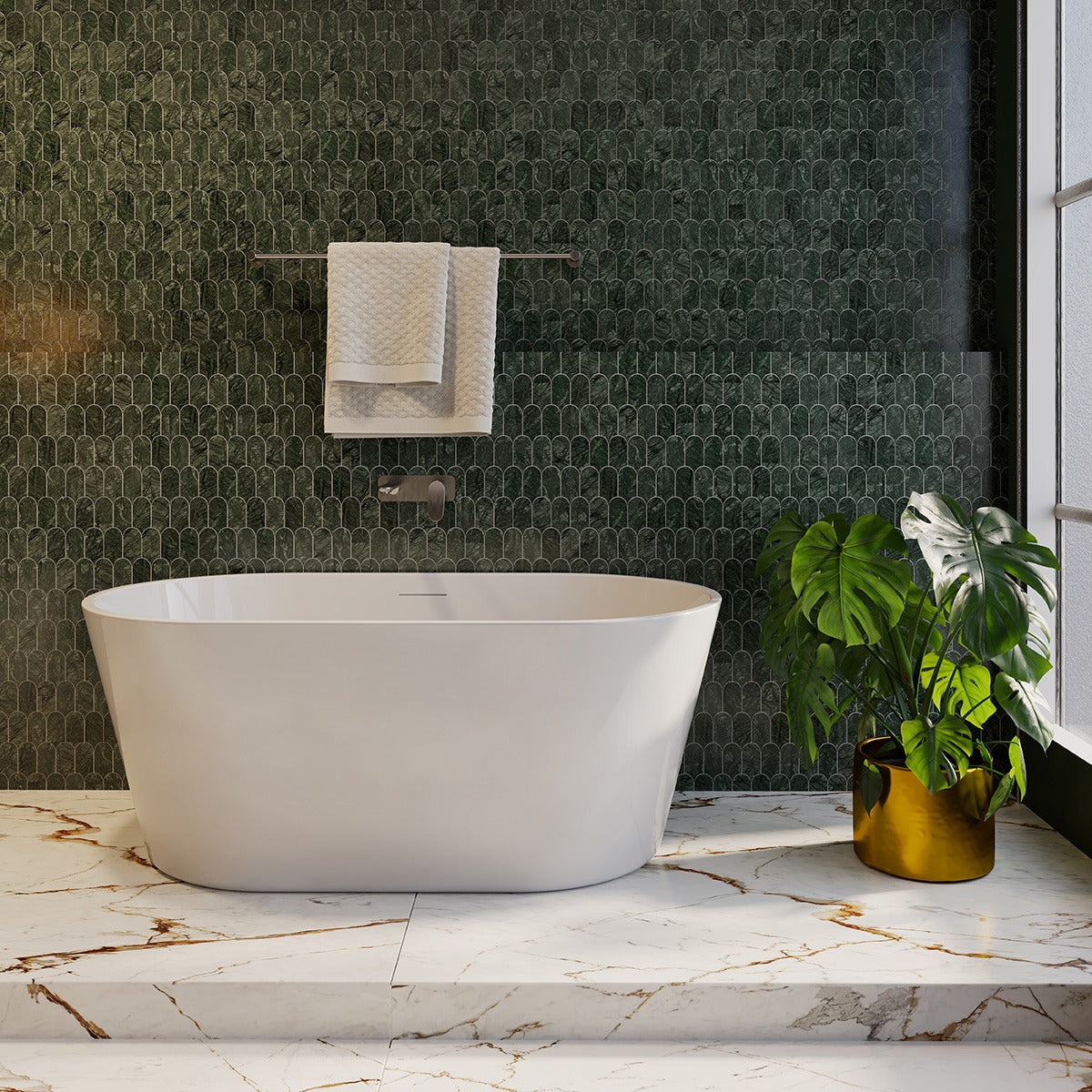 Raymor Winton freestanding bath in white acrylic, shown in a bathroom setting with centre waste and integrated overflow opening