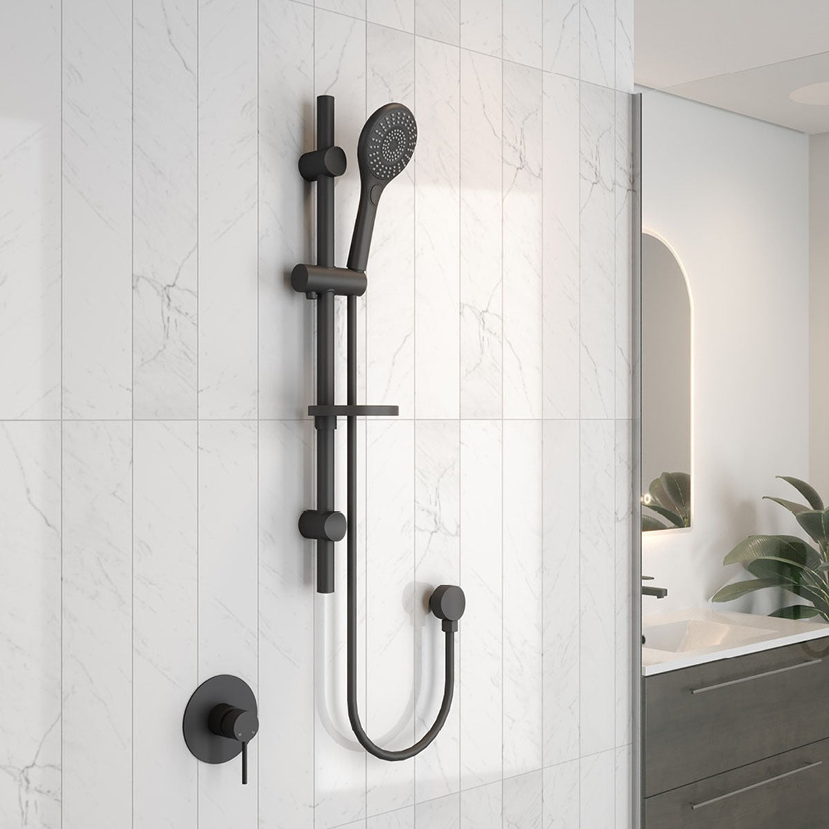 Raymor Winton black rail shower with hand shower and wall mixer on a white tiled bathroom wall