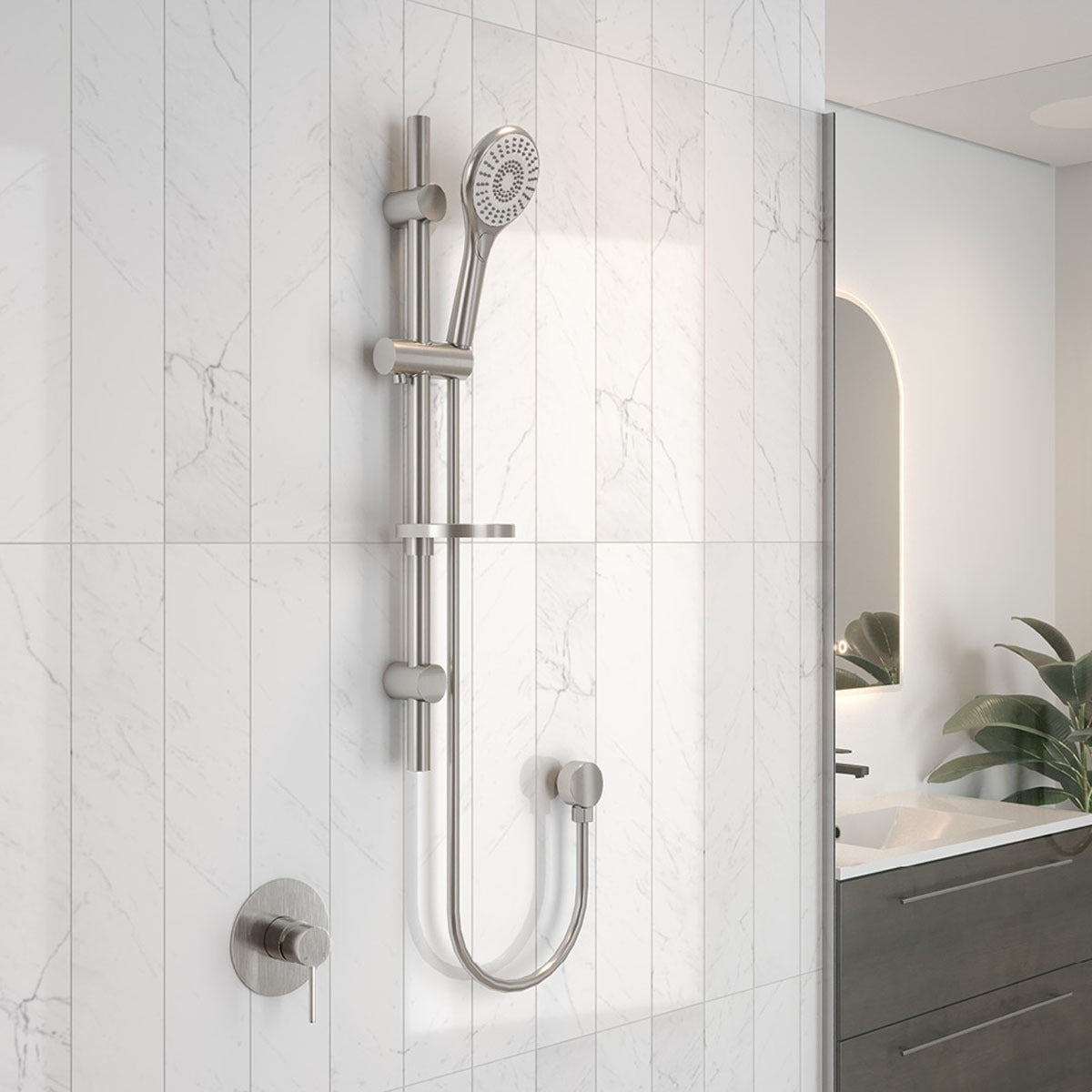Raymor Winton brushed nickel rail shower with hand shower, mounted on white marble-look bathroom tiles