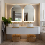 Timberline Church double door shaving cabinet in white, arched mirrored front, shown in a bathroom vanity setting