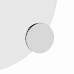 Thermogroup round clip-on magnifying mirror on a frameless mirror, shown in close-up with chrome finish
