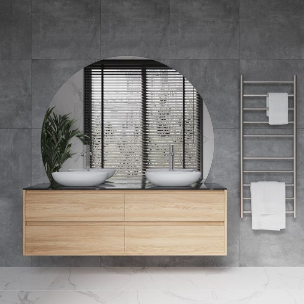 Thermogroup Ablaze D-shaped polished edge mirror above twin vanity in modern bathroom, with grey tiles and towel ladder
