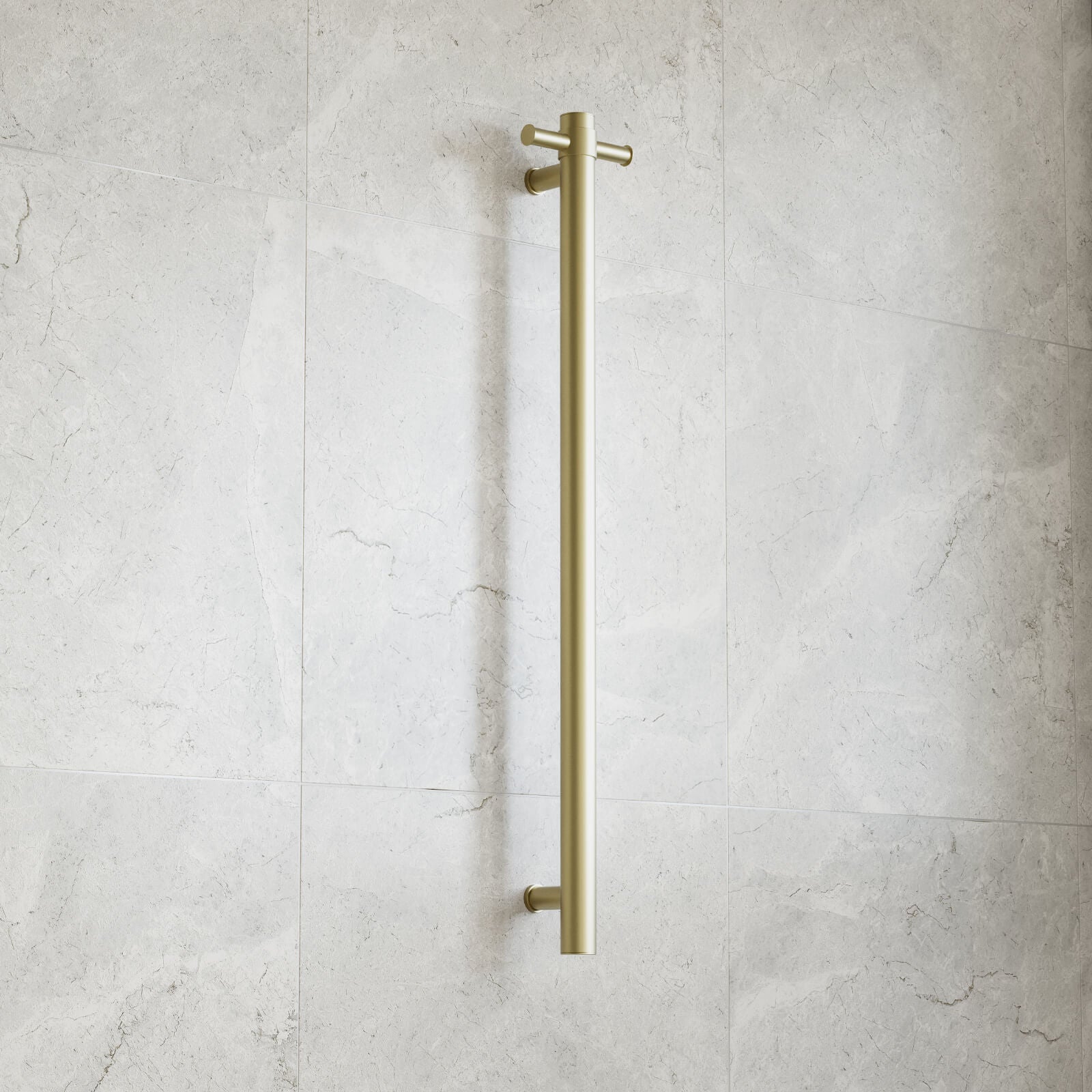 Thermogroup brushed brass vertical single bar heated towel rail on light tiled bathroom wall