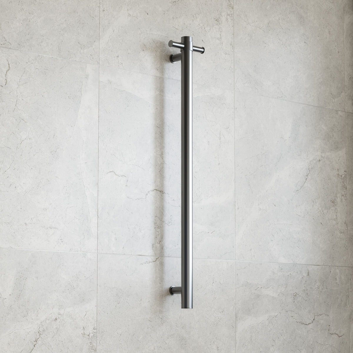 Thermogroup gunmetal round vertical heated towel rail, single bar, wall mounted on light stone bathroom tiles