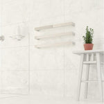 Thermogroup Thermorail square single heated towel rail in polished stainless steel on a white tiled bathroom wall