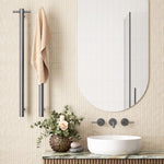 Thermogroup brushed gun metal vertical heated towel rail with optional hook in a bathroom setting