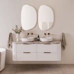 ADP Thirroul wall hung vanity with curved white fluted drawers, grey benchtop and twin round basins in a bathroom setting