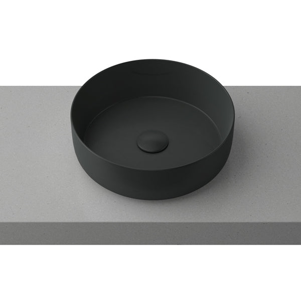 Timberline Allure black round above counter basin on a grey benchtop, with thin rim and centred waste plug