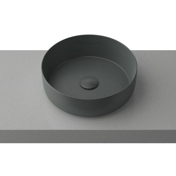 Timberline Allure grey round above counter basin on a vanity top, shown front-on with thin rim and plug detail