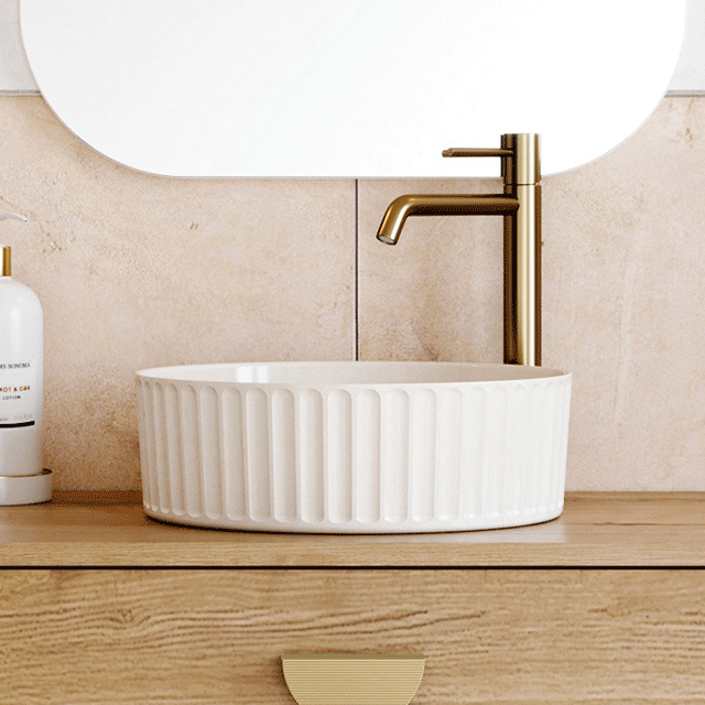 Timberline Allure Flute white round above counter basin, glossy ceramic, with fluted exterior on a timber vanity top
