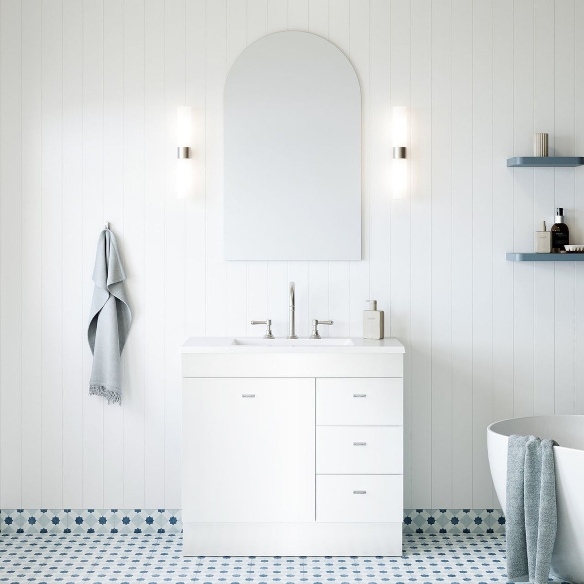 Timberline Bargo floor standing vanity in white with Regal mineral composite top, shown in a bright bathroom setting