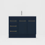 Timberline Bargo floor standing vanity, navy blue with white top, three drawers and brass handles, front view