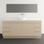 Timberline Bargo floor standing vanity in satin white, with white Silksurface top and round basin in bathroom setting