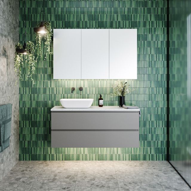 Timberline Billie wall hung ensuite vanity in grey with SilkSurface top and above counter basin, shown in a bathroom setting