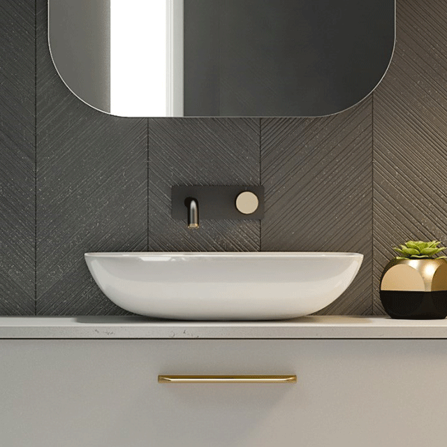 Timberline Bloom white rectangular above counter basin on a vanity bench, shown in a bathroom lifestyle setting