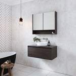 Timberline Delaware wall hung vanity in dark woodgrain finish with white basin in a modern bathroom