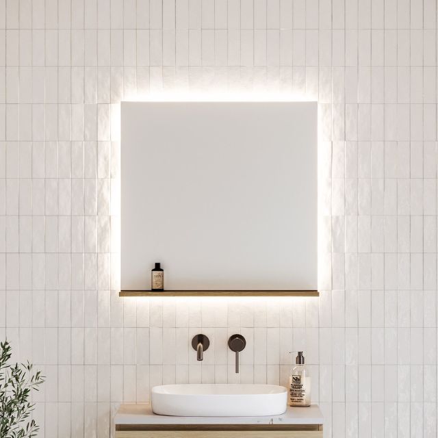 Timberline Essence rectangular bathroom mirror with shelf, lit edge and white tile backdrop above vanity