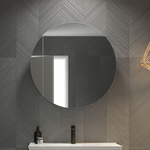 Timberline Havana round shaving cabinet mirror in dark bathroom, wall-mounted above vanity