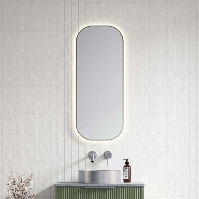 Timberline Jazz Arch Frame Mirror in white satin, vertical wall-hung arched mirror above a bathroom vanity with backlit edge