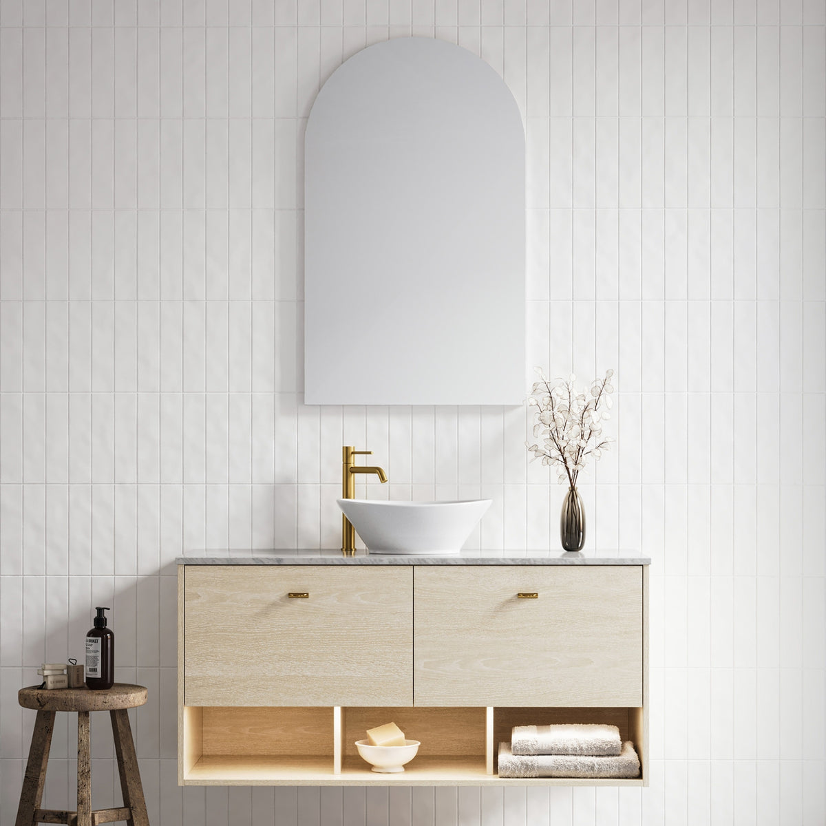 Timberline Kansas wall hung vanity in light woodgrain with above counter basin and open shelves, styled in a bathroom setting