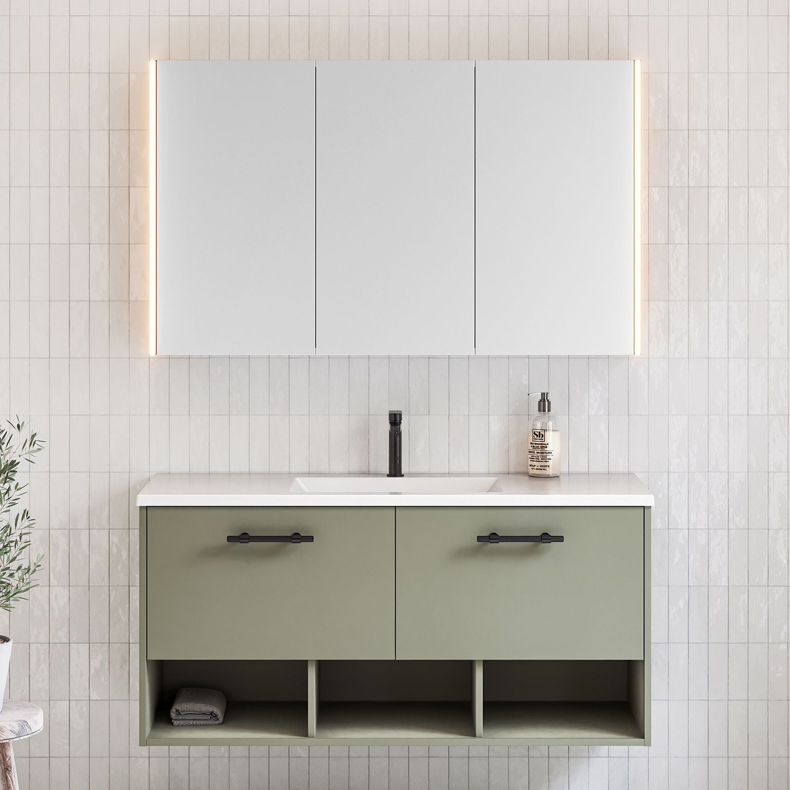 Timberline Kansas wall hung vanity with Regal acrylic top, olive satin finish, black handles, in bathroom setting