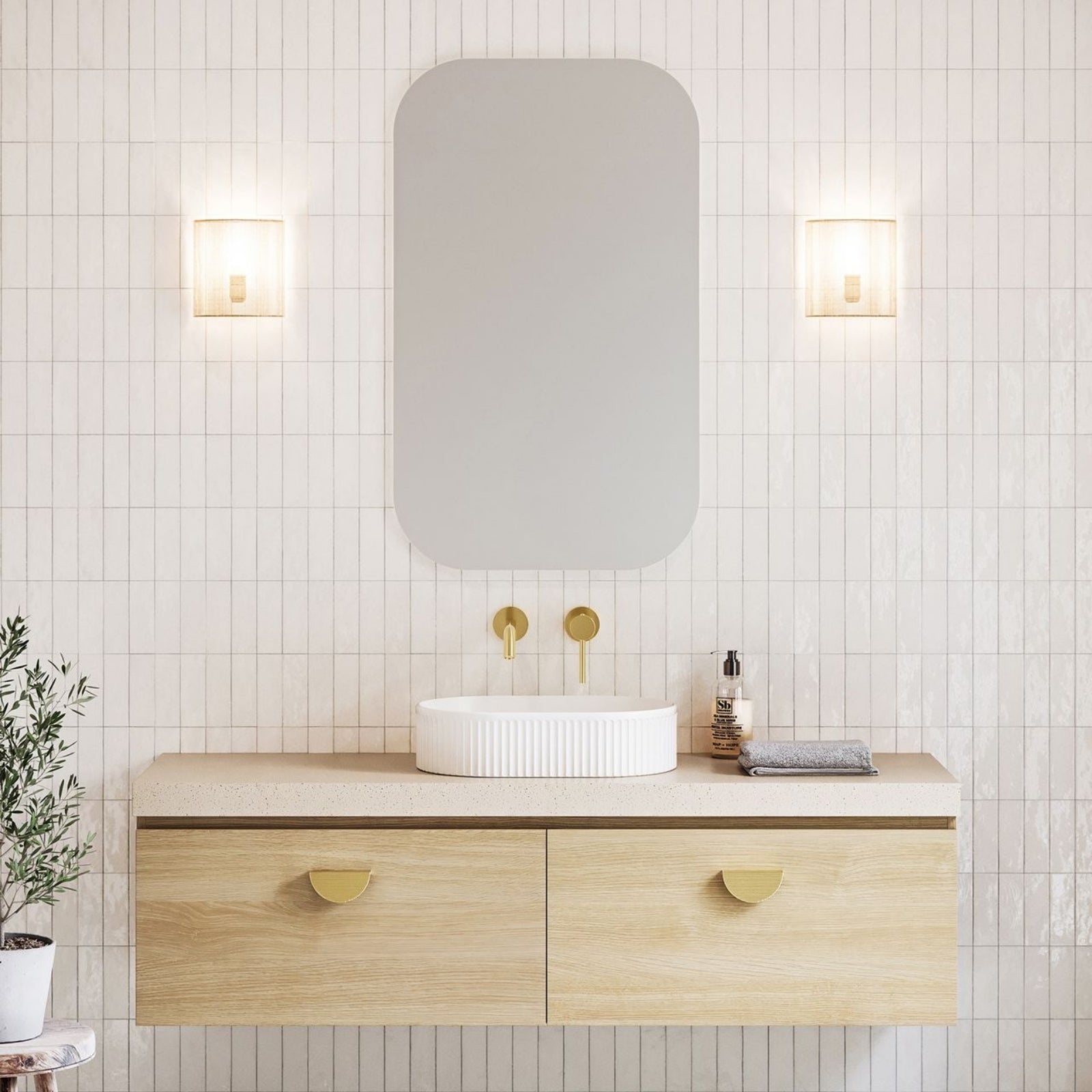 Timberline Kingsley wall hung vanity in light woodgrain with silk surface top and above counter basin, shown in bathroom setting