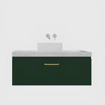 Timberline Kingsley wall hung vanity with white top, above counter basin and dark green cabinet with brass handle