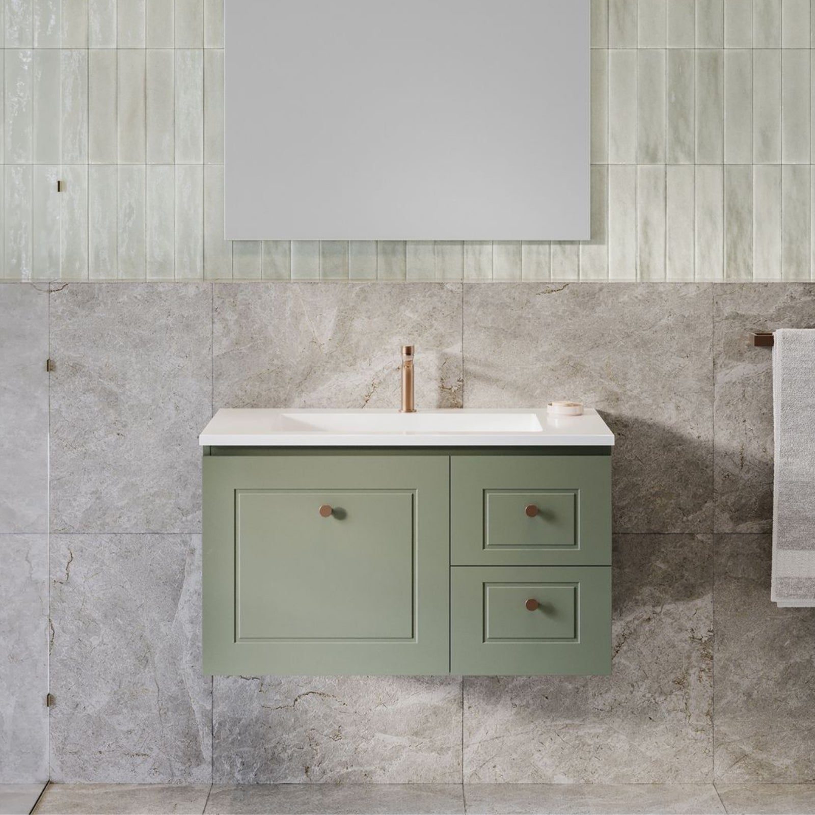 Timberline wall hung vanity in sage green with white mineral composite top, centre basin and brushed bronzed knobs in bathroom setting