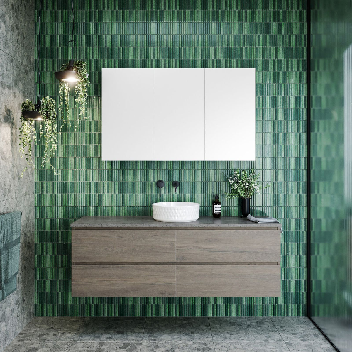 Timberline Nevada Plus wall hung vanity in woodgrain finish with white above counter basin in green tiled bathroom