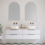Timberline Nevada Plus wall hung vanity in white with double above counter basins and marble-look top in a bathroom setting