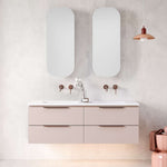 Timberline Nevada Plus wall hung vanity with Regal Acrylic top in pale pink, shown in a bathroom setting with drawers and twin basins