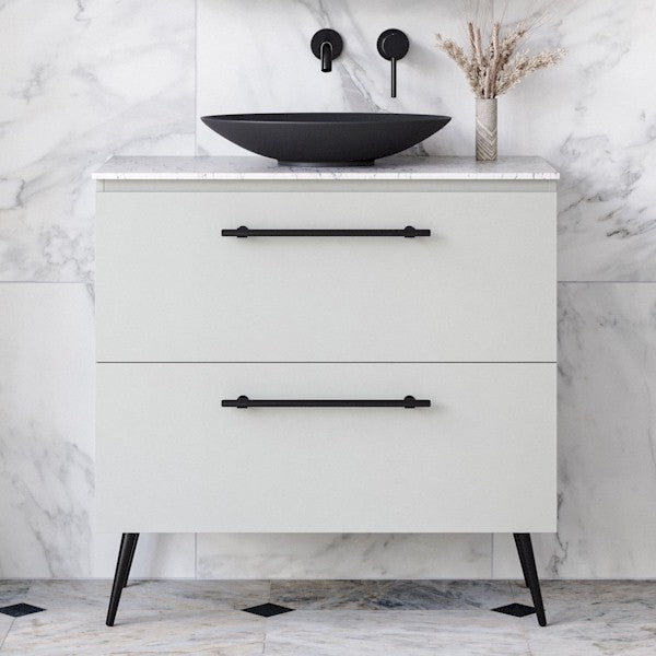 Timberline Nevada Plus floor standing vanity with legs, white drawers, black handles and above-counter basin, front view