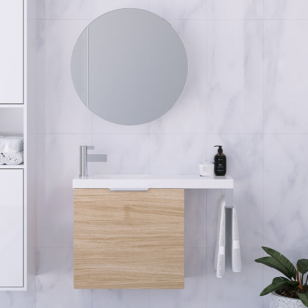 Timberline Oscar wall hung vanity in classic oak with white top and chrome towel rail, styled in a compact bathroom.