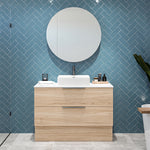 Timberline Oxbow freestanding vanity in woodgrain finish with white stone top and basin, front view
