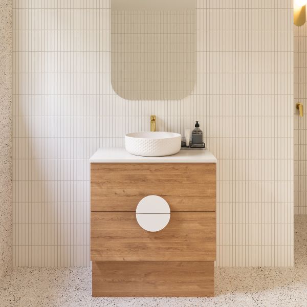 Timberline Oxbow freestanding vanity with woodgrain drawers, white stone top and round basin in bathroom setting