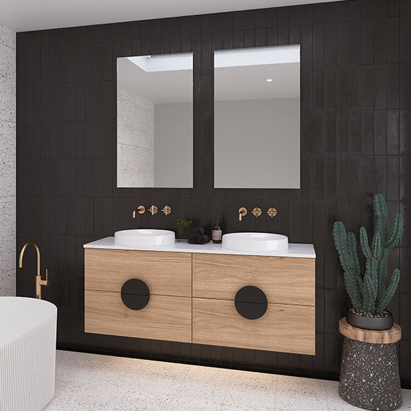 Timberline Oxbow wall hung vanity in Tasmanian Oak with white top, twin round basins and black round handles in bathroom setting