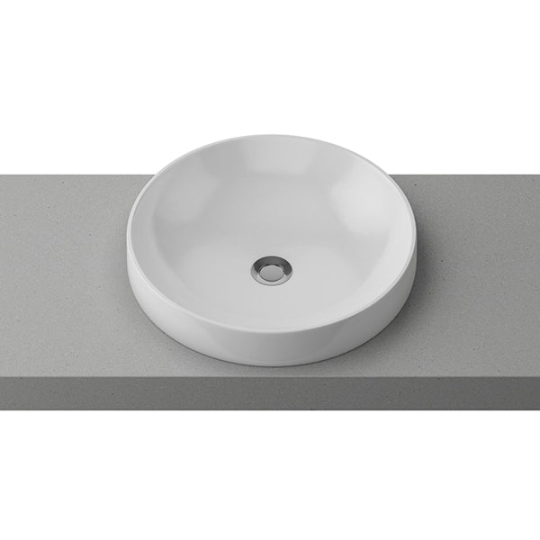 Timberline round gloss white ceramic inset basin with thin rim and centre waste hole on grey benchtop