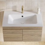 Timberline Rockford wall hung vanity with white Dolomite basin top and light timbergrain doors in bathroom view
