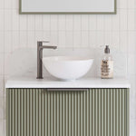 Timberline Rose white round above counter bathroom basin on a vanity with tapware