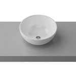 Timberline Rose white gloss ceramic round above counter basin on grey benchtop, front view