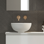 Timberline Rose white round above-counter basin in a modern vanity setting