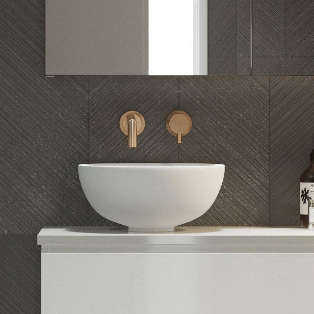 Timberline Rose white round above-counter basin in a modern vanity setting