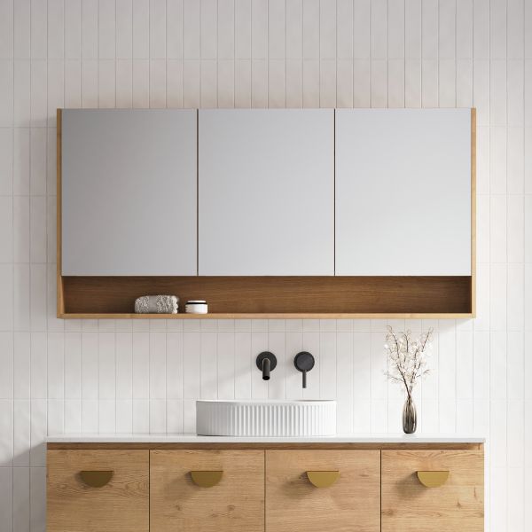 Timberline Sanremo shaving cabinet with three mirrored doors, woodgrain frame and open shelf, mounted above a bathroom vanity