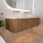 Timberline Santos Apollo fluted wall hung vanity in woodgrain finish with white top and twin above counter basins in bathroom