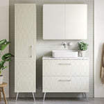Timberline Sutherland House Deco white vanity with drawer fronts, freestanding on metal legs, shown in a bathroom setting