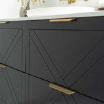 Timberline Sutherland House farmhouse vanity in matte black, close-up of routed drawer fronts with brass handles and white top