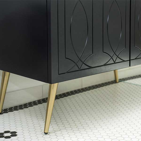 Timberline Sutherland House Regency black vanity close-up with gold angled legs and decorative drawer front detail