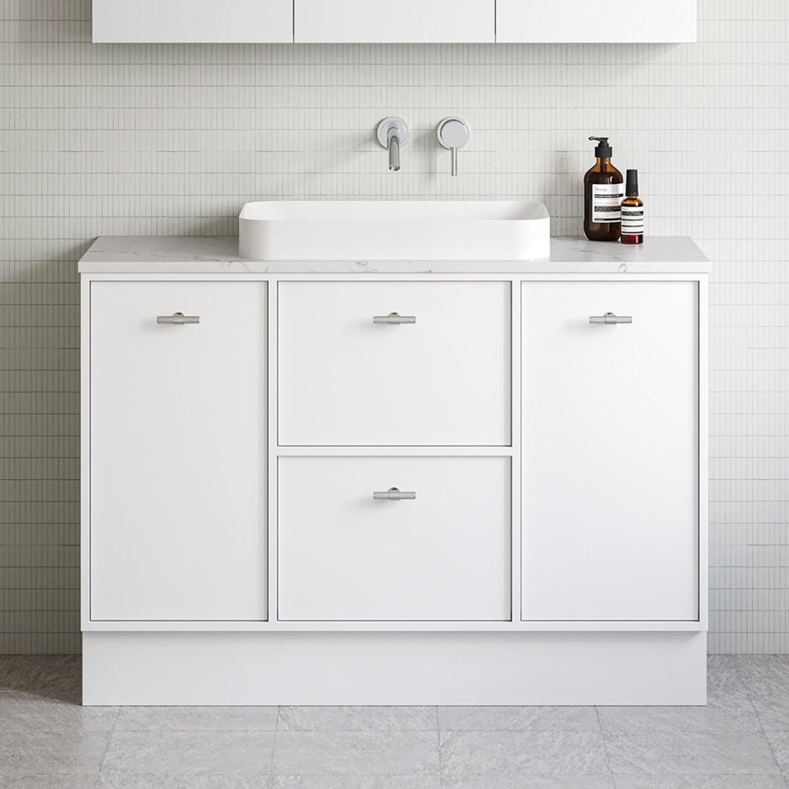 Timberline Takano white floor standing vanity with SilkSurface top and above counter basin in bathroom setting