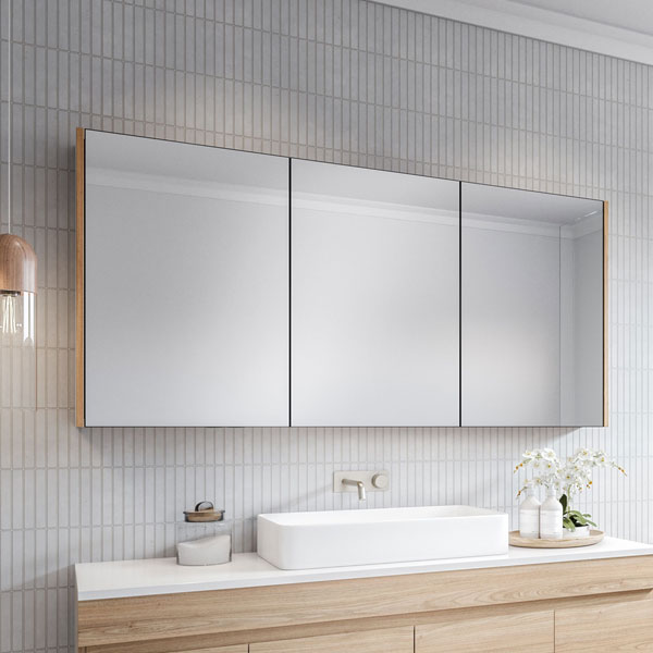 Timberline Denver shaving cabinet with three mirrored doors and timber side panels above a bathroom vanity