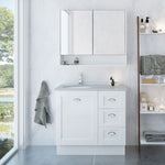 Timberline Victoria white floor standing vanity with grey top, under counter basin and mirrored shaving cabinet in bathroom setting